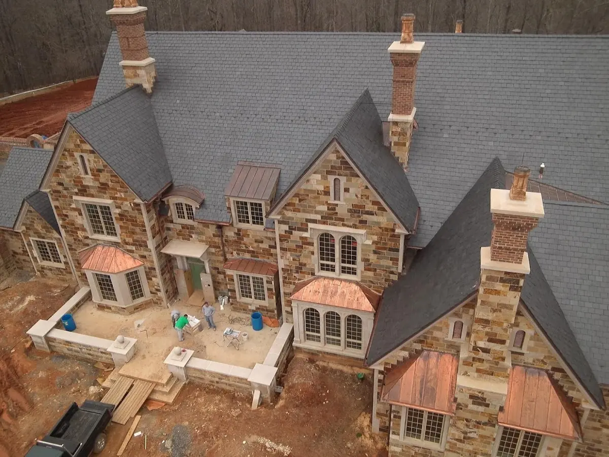 Craftsman Roofing Slate Roof Repair project in New Hampshire Gardens